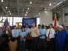 Students join Governor Scott at the podium for the press conference